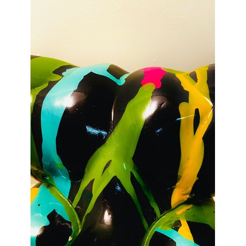 72 - CONTEMPORARY DIVER SCULPTURE IN PAINT SPLATTERED FINISH. 81cm H x 82cm W x 28cm D.