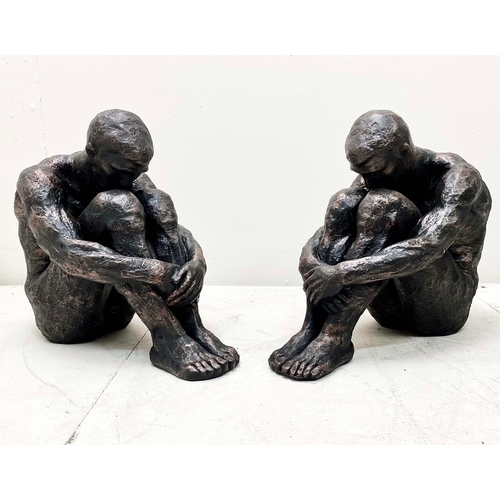 76 - PAIR OF SITTING MAN SCULPTURES IN BRONZED FINISH RESIN. 34cm H x 21cm W x 49cm D.