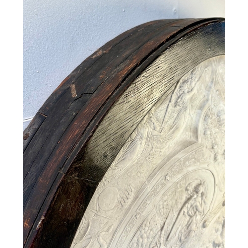 8 - CLASSICAL STYLE PLASTER WALL PLAQUE. in a black frame, 100cm H x 73cm W.