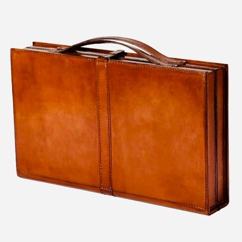 87 - TRAVELLING BACKGAMMON SET. 7cm H x 23cm W x 43cm D.