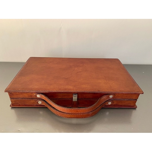 87 - TRAVELLING BACKGAMMON SET. 7cm H x 23cm W x 43cm D.