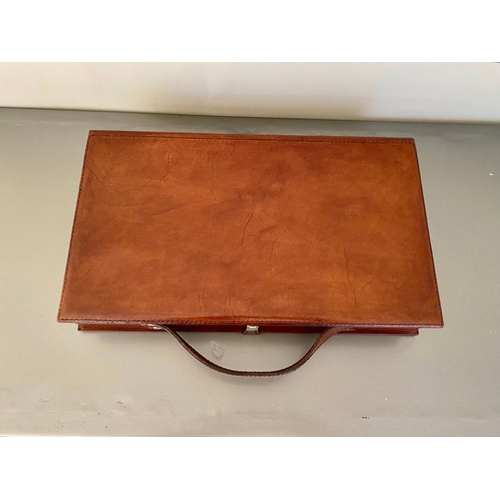 87 - TRAVELLING BACKGAMMON SET. 7cm H x 23cm W x 43cm D.