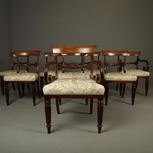 860 - SET OF EIGHT WILLIAM IV MAHOGANY DINING CHAIRS. On reeded front supports
To include two carvers
86cm... 
