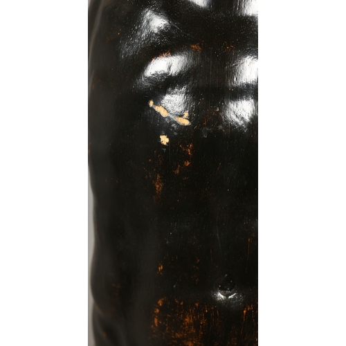 19 - A PAIR OF WOODEN MALE TORSO FIGURES. ebonised, measuring 70cm high, complete with black painted terr... 