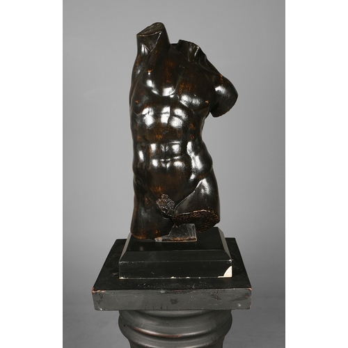 19 - A PAIR OF WOODEN MALE TORSO FIGURES. ebonised, measuring 70cm high, complete with black painted terr... 