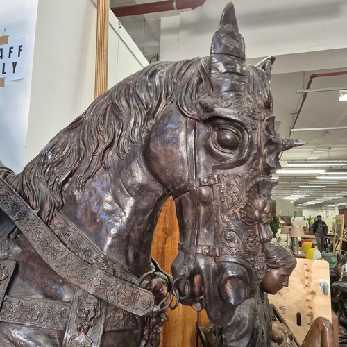 25 - LIFESIZE ROMAN SOLDIER ON HORSEBACK SCULPTURE. cast bronze, 295cm x 230cm x 125cm approx.