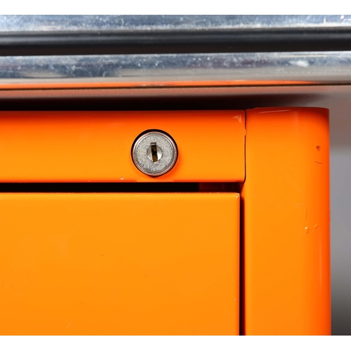 274 - MULLER CLASSIC LINE CHRYSLER DESK. orange lacquered steel, with six drawers, 77cm H x 176cm W x 80cm... 