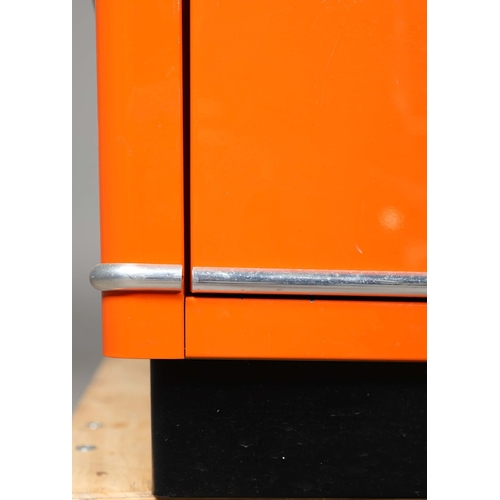 274 - MULLER CLASSIC LINE CHRYSLER DESK. orange lacquered steel, with six drawers, 77cm H x 176cm W x 80cm... 