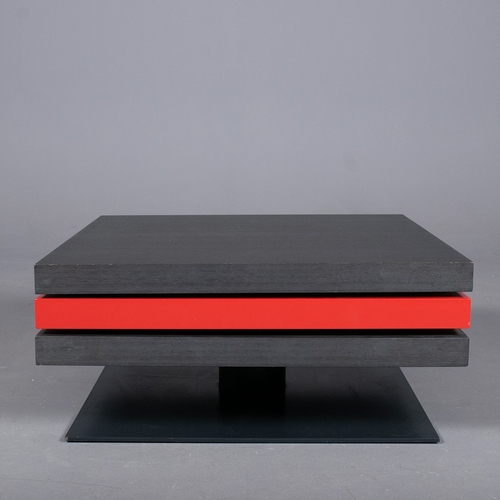 284 - LIGNE ROSET STRATES RED AND BLACK COFFEE TABLE. The top two tiers rotate
35cm H x 80cm W x 80cm D.