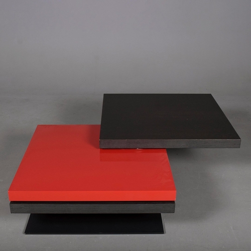 284 - LIGNE ROSET STRATES RED AND BLACK COFFEE TABLE. The top two tiers rotate
35cm H x 80cm W x 80cm D.