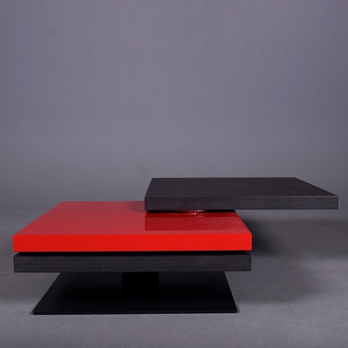 284 - LIGNE ROSET STRATES RED AND BLACK COFFEE TABLE. The top two tiers rotate
35cm H x 80cm W x 80cm D.