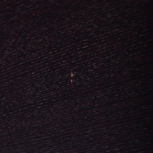 284 - LIGNE ROSET STRATES RED AND BLACK COFFEE TABLE. The top two tiers rotate
35cm H x 80cm W x 80cm D.