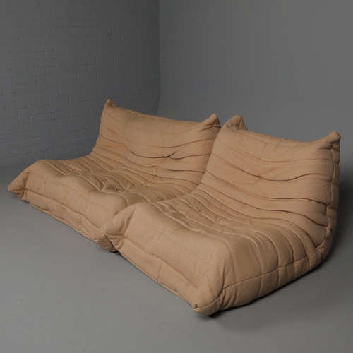 285 - LIGNE ROSET TOGO SOFA AND CHAIR (2). 130cm w in a tan fabric and a matching chair 80cm w, marks to f... 