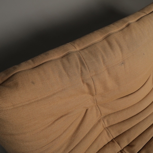 285 - LIGNE ROSET TOGO SOFA AND CHAIR (2). 130cm w in a tan fabric and a matching chair 80cm w, marks to f... 