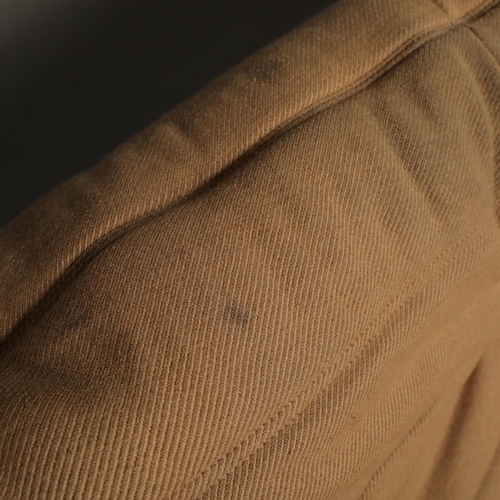 285 - LIGNE ROSET TOGO SOFA AND CHAIR (2). 130cm w in a tan fabric and a matching chair 80cm w, marks to f... 