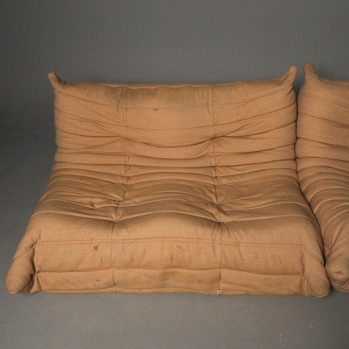 285 - LIGNE ROSET TOGO SOFA AND CHAIR (2). 130cm w in a tan fabric and a matching chair 80cm w, marks to f... 