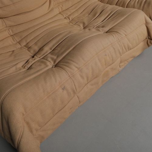 285 - LIGNE ROSET TOGO SOFA AND CHAIR (2). 130cm w in a tan fabric and a matching chair 80cm w, marks to f... 