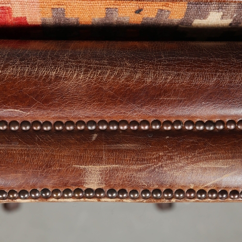 305 - ATTRIBUTED TO BARKER AND STONEHOUSE CAVENDISH LEATHER ARMCHAIR, A PAIR. tan leather with reversible ... 