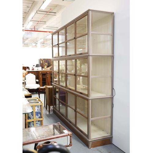 315 - ROCHE BOBOIS ARCHITECTE BOOKCASE. glazed, with painted frame, bears plaques in French 225cm t x 233 ... 