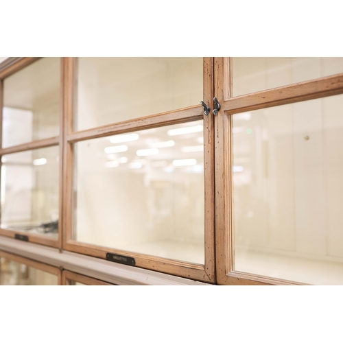 315 - ROCHE BOBOIS ARCHITECTE BOOKCASE. glazed, with painted frame, bears plaques in French 225cm t x 233 ... 