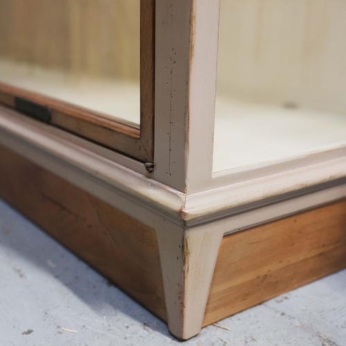 315 - ROCHE BOBOIS ARCHITECTE BOOKCASE. glazed, with painted frame, bears plaques in French 225cm t x 233 ... 