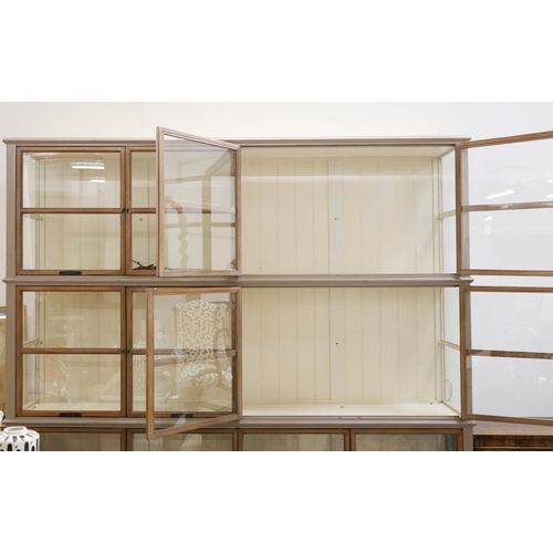 315 - ROCHE BOBOIS ARCHITECTE BOOKCASE. glazed, with painted frame, bears plaques in French 225cm t x 233 ... 