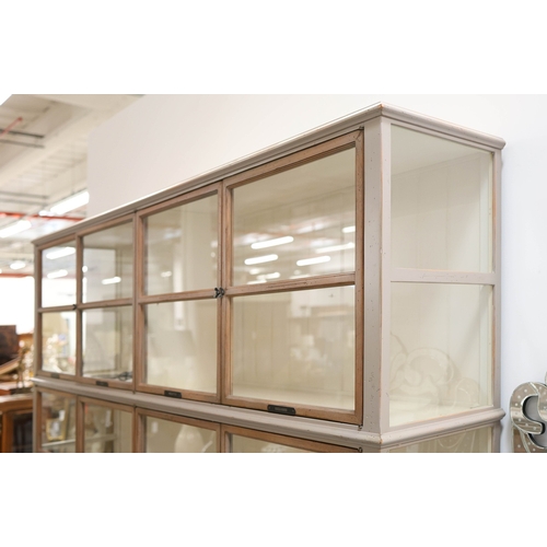 315 - ROCHE BOBOIS ARCHITECTE BOOKCASE. glazed, with painted frame, bears plaques in French 225cm t x 233 ... 