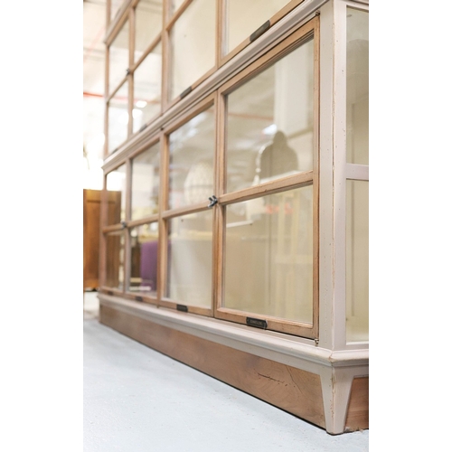 315 - ROCHE BOBOIS ARCHITECTE BOOKCASE. glazed, with painted frame, bears plaques in French 225cm t x 233 ... 