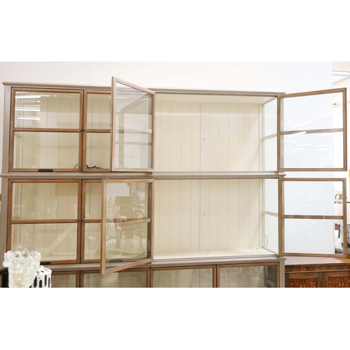 315 - ROCHE BOBOIS ARCHITECTE BOOKCASE. glazed, with painted frame, bears plaques in French 225cm t x 233 ... 