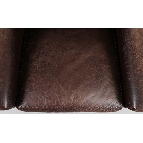 327 - ERHARDSEN & ANDERSEN MATADOR SWIVEL ARMCHAIR. by Aage Christiansen, 90cm W x 80cm D.