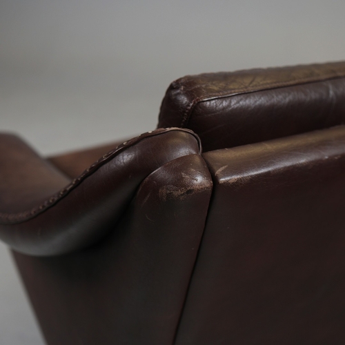 327 - ERHARDSEN & ANDERSEN MATADOR SWIVEL ARMCHAIR. by Aage Christiansen, 90cm W x 80cm D.