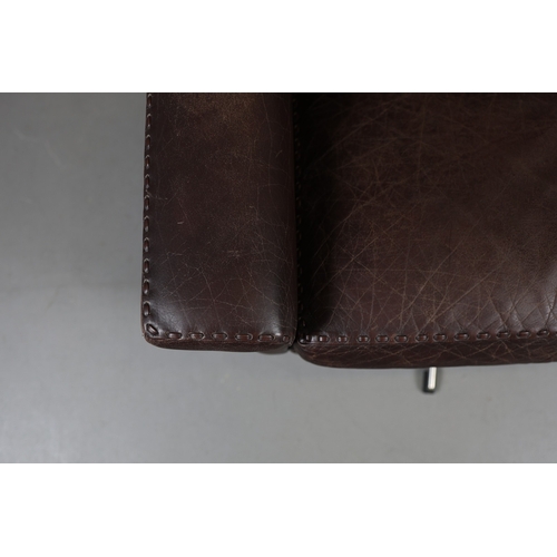 327 - ERHARDSEN & ANDERSEN MATADOR SWIVEL ARMCHAIR. by Aage Christiansen, 90cm W x 80cm D.