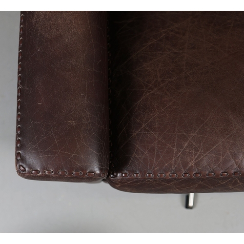 327 - ERHARDSEN & ANDERSEN MATADOR SWIVEL ARMCHAIR. by Aage Christiansen, 90cm W x 80cm D.