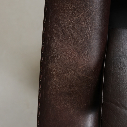 327 - ERHARDSEN & ANDERSEN MATADOR SWIVEL ARMCHAIR. by Aage Christiansen, 90cm W x 80cm D.