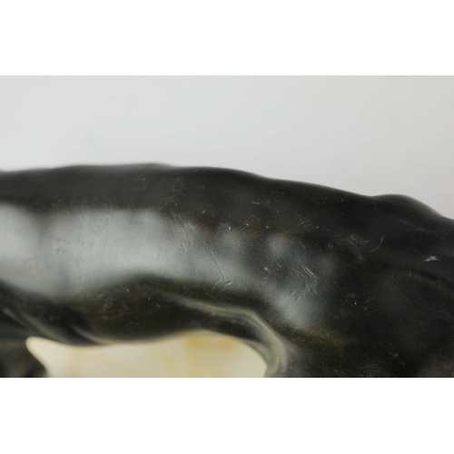 5 - A FRENCH ART DECO LION AND LIONESS SCULPTURE. in spelter on stepped black and white marble base. 85c... 