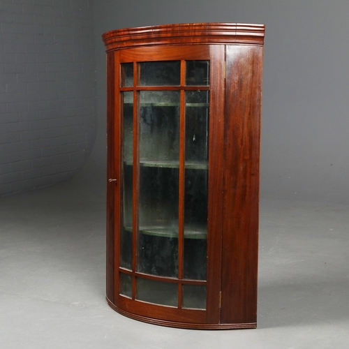 846 - CORNER CUPBOARD. mahogany, with a glazed door 106 cm t x 71 cm w x 51 cm d.