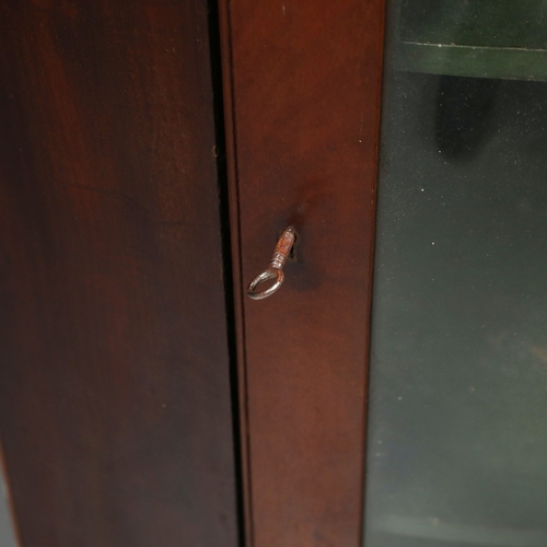 846 - CORNER CUPBOARD. mahogany, with a glazed door 106 cm t x 71 cm w x 51 cm d.