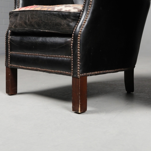 576 - ATTRIBUTED TO ANDREW MARTIN ARMCHAIRS, A PAIR. black leather with reversible kilim seat cushions, 74... 