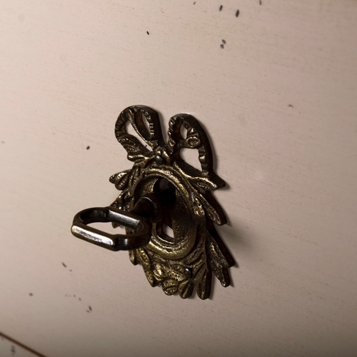 579 - ROCHE BOBOIS SEVEN DRAWER CHEST. in an antiqued painted finish 142 cm t x 70 cm w x 40 cm d.