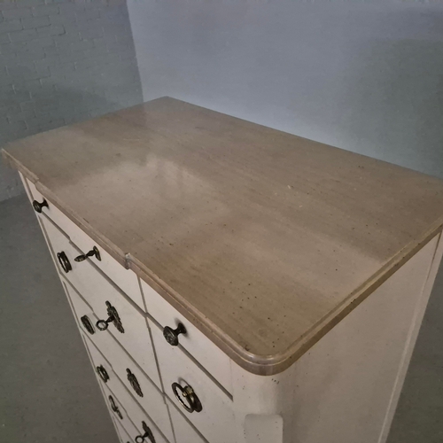 579 - ROCHE BOBOIS SEVEN DRAWER CHEST. in an antiqued painted finish 142 cm t x 70 cm w x 40 cm d.