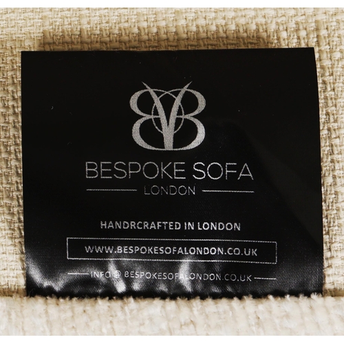 586 - BESPOKE SOFA LONDON IVORY FABRIC UPHOLSTERED SOFA. 196cm x 95cm x 86cm approx.