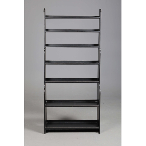 596 - OKA WATERFALL BOOKCASE. black, with distressed edges 205cm t x 90 cm w x 26 cm d.