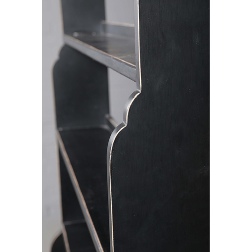 596 - OKA WATERFALL BOOKCASE. black, with distressed edges 205cm t x 90 cm w x 26 cm d.