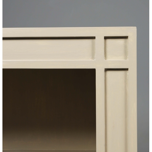 598 - OKA ANASTASIUS BOOKSHELVES, A PAIR. Grey painted finish 84cm H x 91cm W x 28cm D.