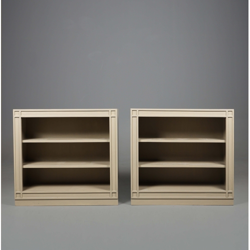 598 - OKA ANASTASIUS BOOKSHELVES, A PAIR. Grey painted finish 84cm H x 91cm W x 28cm D.