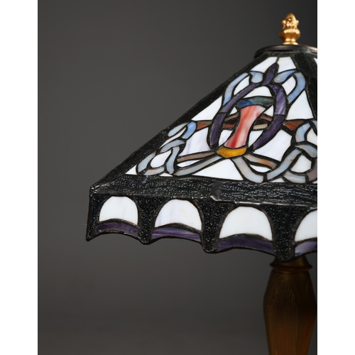 129 - TIFFANY STYLE TABLE LAMPS, A PAIR. each with hexagonal shades with a repeated symmetrical designs, r... 