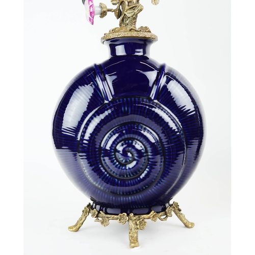 138 - CANDELABRA, A PAIR. in the form of birds amongst trees, shell form bases, ceramic and gilt metal, 65... 