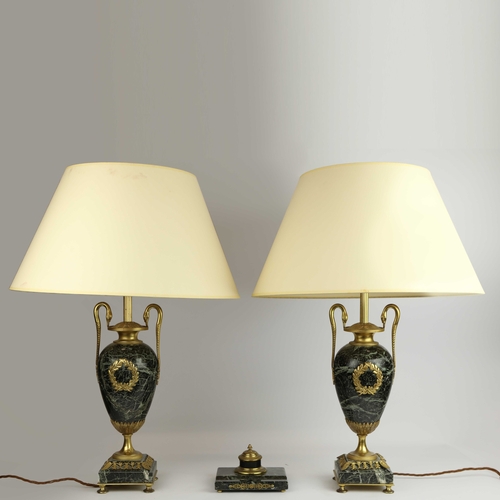 141 - A PAIR OF FRENCH GREEN VARIEGATED MARBLE EMPIRE LAMPS. (3). ormolu mounted with shades. Along with a... 
