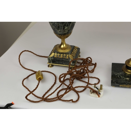 141 - A PAIR OF FRENCH GREEN VARIEGATED MARBLE EMPIRE LAMPS. (3). ormolu mounted with shades. Along with a... 