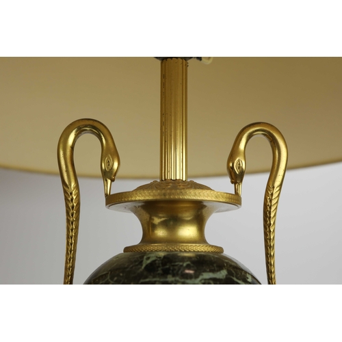 141 - A PAIR OF FRENCH GREEN VARIEGATED MARBLE EMPIRE LAMPS. (3). ormolu mounted with shades. Along with a... 